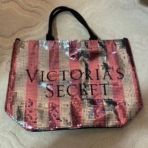 Victoria’s Secret striped sequin tote bag.
